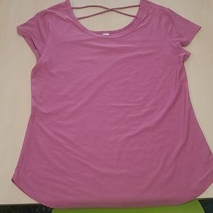 Pink shirt with cris-cross on the back